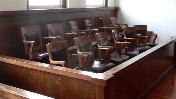 empty jury box in a courtroom