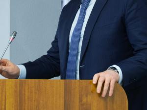 lawyer standing at a podium